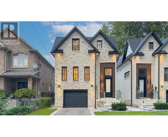 A house with a garage is shown in front of a sign that says "REALTOR".