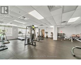 A gym with a variety of equipment is available at this Brokerage realty.