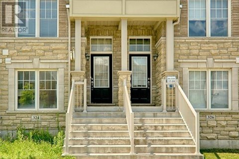 A house with a black front door and a porch.