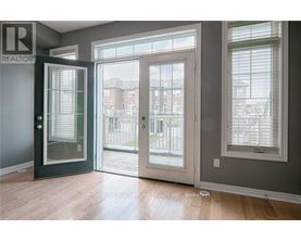 A room with a REALTOR sign on the door.