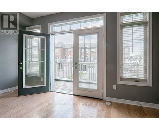 A room with a REALTOR sign on the door.