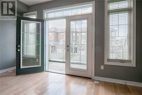 A room with a REALTOR sign on the door.