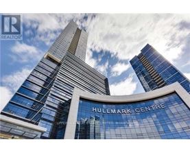 The Hullmark Centre is a tall building with a glass facade.