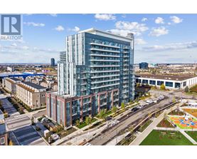 A modern multi-story building with a glass facade is the focal point of the image.