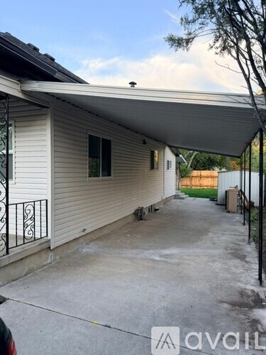 A house with a covered patio area.