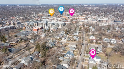 An aerial view of a residential area with four marked locations.