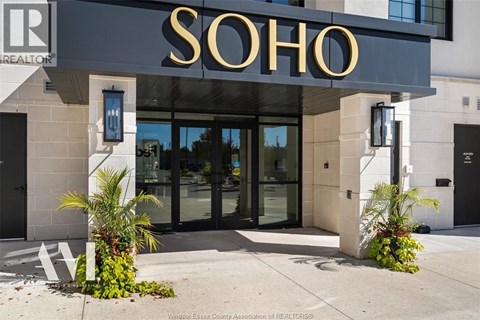 The front of a building with the word "SOHO" written on it.