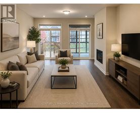 A living room with a white couch, a coffee table, and a flat screen TV.