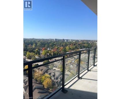 A balcony with a view of a residential area.