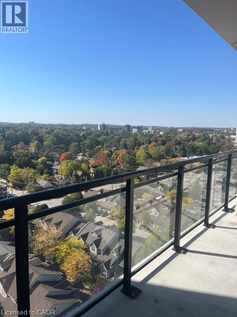 A balcony with a view of a residential area.