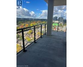 A balcony with a view of a city skyline.