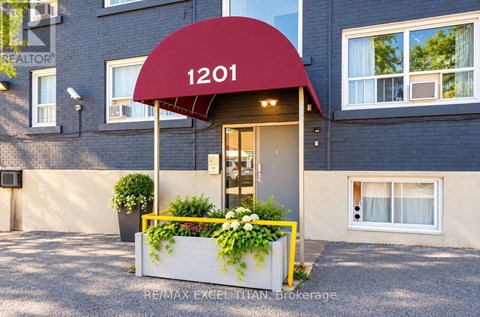 The front of a building with the number 1201 on it.