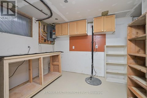 A room with a lot of unfinished wood framing.