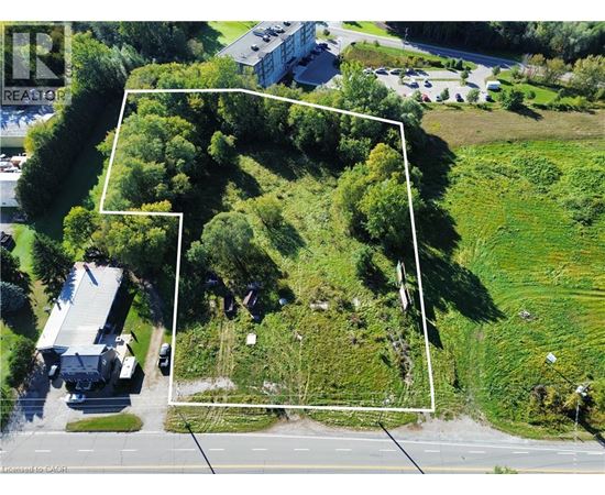 A bird's eye view of a property with a white line demarcating the boundary.