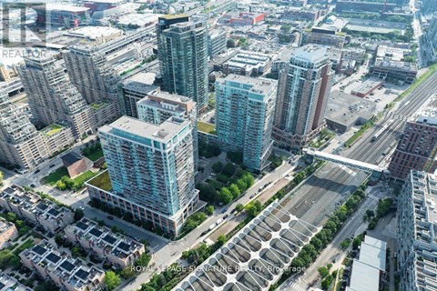 A cityscape with a mix of residential and commercial buildings.