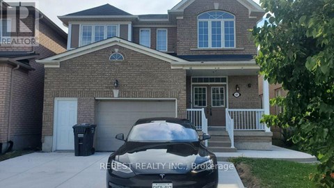 A house with a car parked in front of it.
