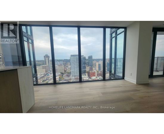 A real estate company's office with a view of the city skyline.