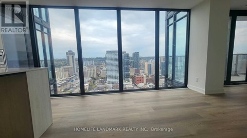 A real estate company's office with a view of the city skyline.