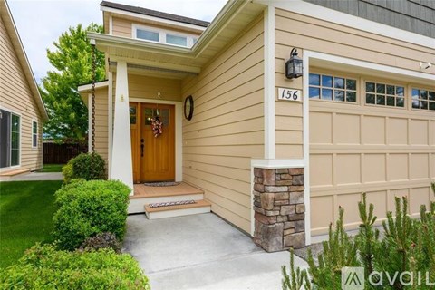 A house numbered 156 is for sale.