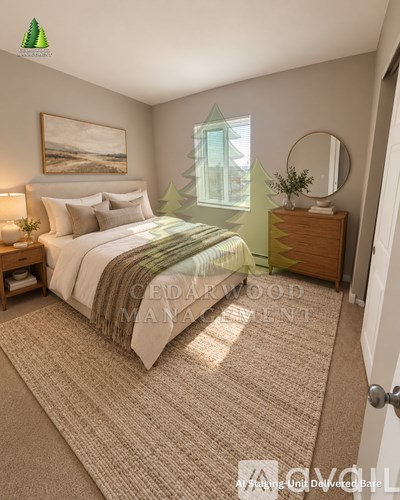 A bedroom with a bed, nightstand, and a painting on the wall.