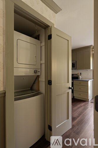 A small kitchen with a dishwasher built into the cabinetry.