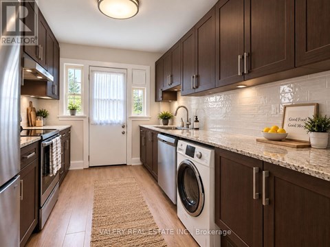 A kitchen with brown cabinets and a washing machine.