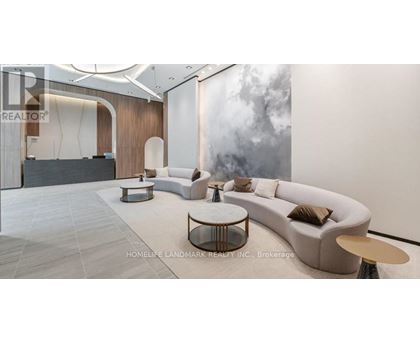 A modern living room with a large sofa and a coffee table.
