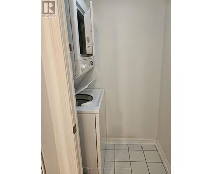 A small kitchen with a microwave and a dishwasher.