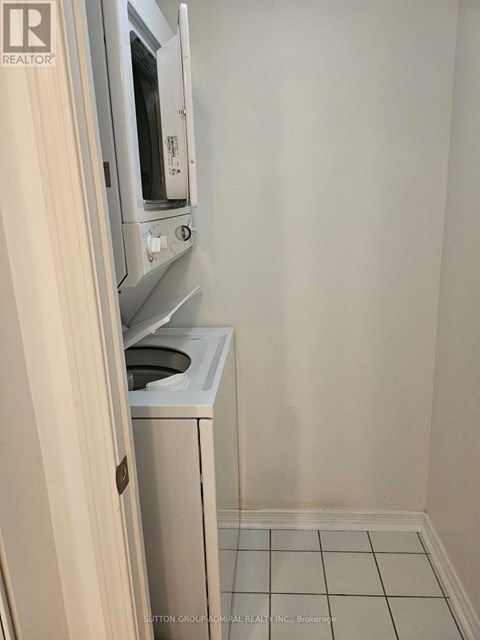 A small kitchen with a microwave and a dishwasher.