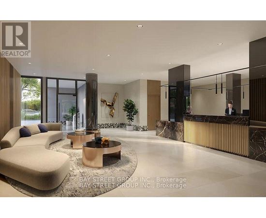 A modern living room with a curved sofa and a coffee table in the center.