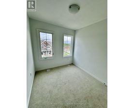 A room with two windows, one facing north and the other south.