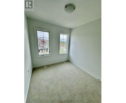 A room with two windows, one facing north and the other south.