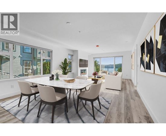 A dining room with a table set for six.