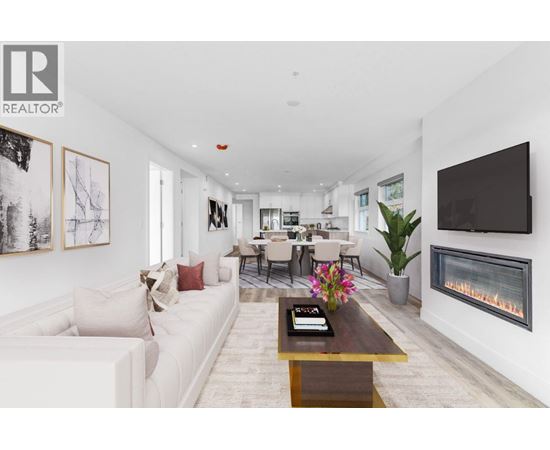 A modern living room with a fireplace and a television.