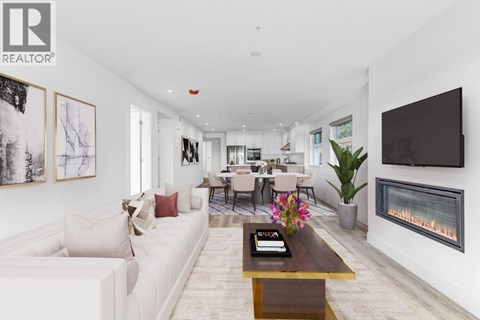 A modern living room with a fireplace and a television.