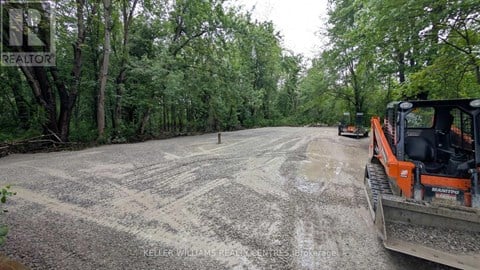 A construction site with a tractor and a bulldozer.
