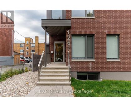 A brick building with the number 1267 on it.