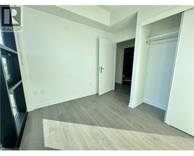 A room with a door and a window.