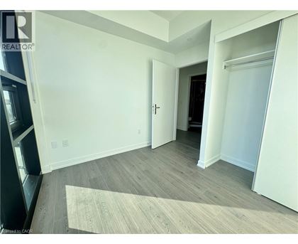 A room with a door and a window.