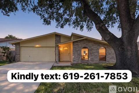 A house with a large tree in front and a text overlay that reads "Kindly text: 619-261-7853".
