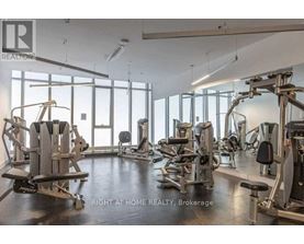 A gym with a variety of equipment is available at this home realty brokerage.