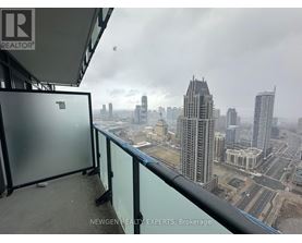 A view from a high-rise building looking down at a cityscape.