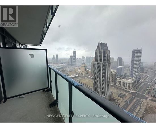 A view from a high-rise building looking down at a cityscape.