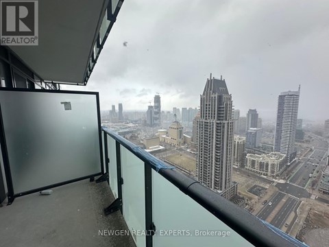 A view from a high-rise building looking down at a cityscape.