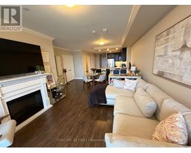 A living room with a fireplace and a couch.