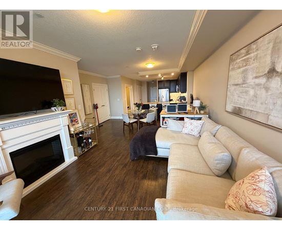 A living room with a fireplace and a couch.