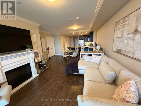 A living room with a fireplace and a couch.