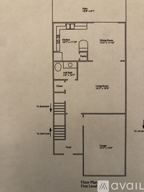 A floor plan of a house with a kitchen, dining room, living room, and closet.