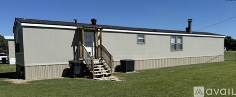 A house with a porch and a covered entrance.