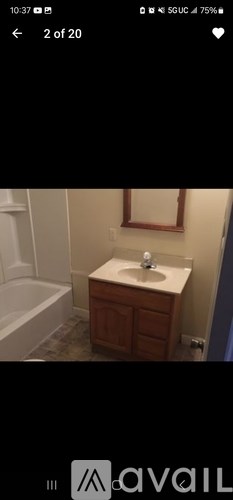 A bathroom with a sink and a bathtub.
